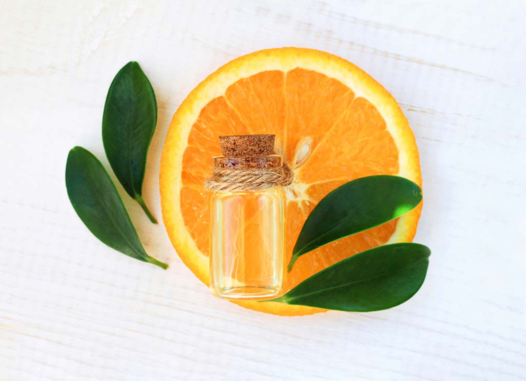 Orange Essential Oil Benefits, Uses & Recipes